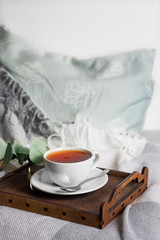 A tray with a cup of hot tea in bed. Herbal tea Hot drink Mood Love Message Breakfast in bed Morning