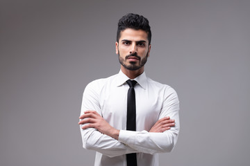 Young bossy man with white shirt and necktie