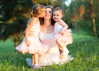 Fototapeta premium mom and two daughters