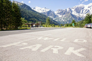 Entrance to the wildpark at the Grossglockner High Alpine Road in Ferleiten, Austria. Shot against a blue sky.