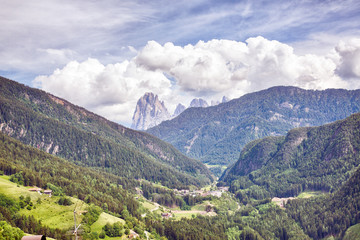 Fototapeta na wymiar Val Gardena valley view direction Ortisei and the world heritage Furchetta mountain peaks