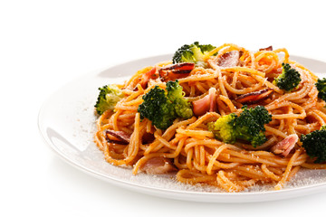 Pasta with pesto sauce, ham, Parmesan and broccoli