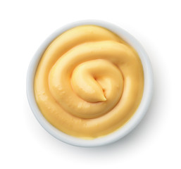 Top view of ramekin with cheese sauce