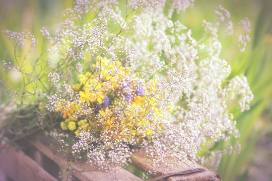 Bouquet of garden flowers and healing herbs
