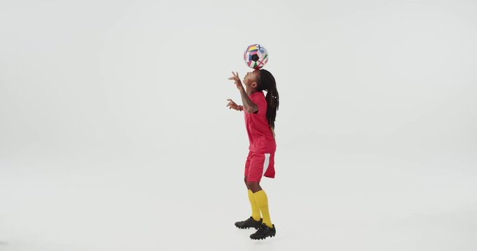 Venezuelan football player keeps the ball on his head.