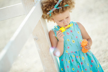 Children with soap bubbles 
