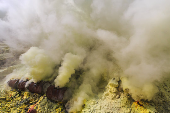 Toxic vappors of sulfur mining, Mount Ijen crater lake, East Java, Indonesia