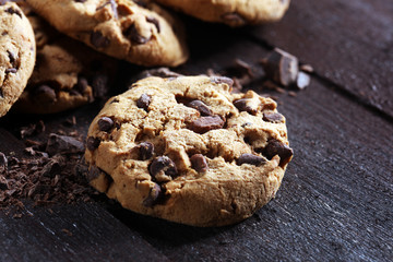 Chocolate cookies on table. Chocolate chip cookies shot with chocolate