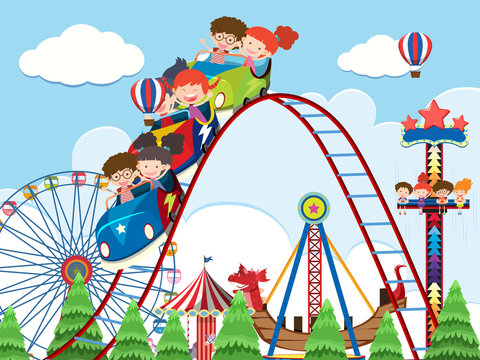 Children and rides at amusement park
