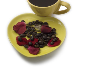 Coffee with beans and rose on a heart shaped plate. Valentine's Day Concept