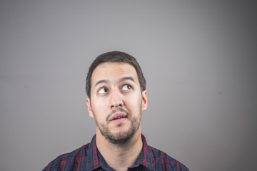 Fototapeta premium Portrait of man looking up