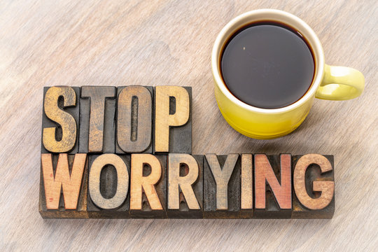 stop worrying word abstract in wood type