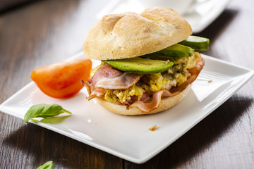 sandwich with bacon, egg and avocado