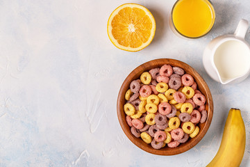 Colorful cereal rings in bowl.