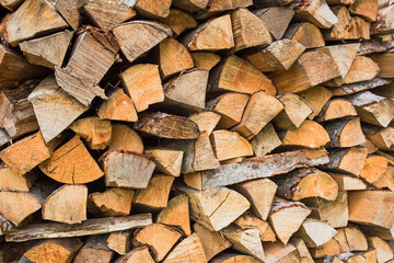 The texture of a large stack of firewood