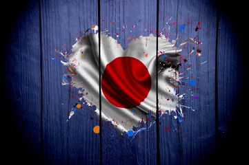 Flag of Japan in the shape of heart on a dark background