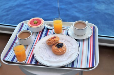 Breakfast tray on a table on a cruise ship balcony