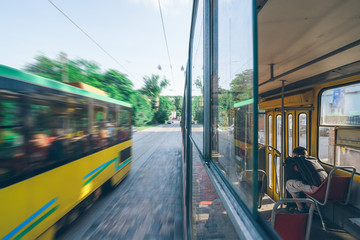Obraz premium view from tram half inside half outside. old european city view