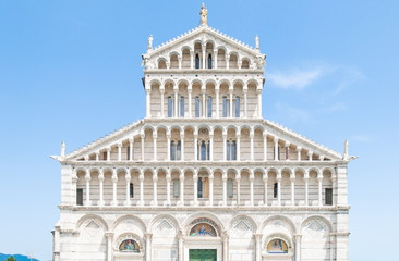 Fototapeta na wymiar Front view of ornamental Romanesque portal of Pisa Cathedral - Roman Catholic cathedral dedicated to the Assumption of the Virgin Mary, Piazza dei Miracoli, Pisa, Tuscany, Italy. UNESCO World Heritage