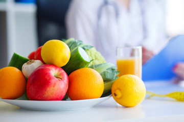Diet. Fitness and healthy food diet concept. Balanced diet with vegetables. Fresh green vegetables,...