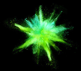 Explosion of coloured powder on black background