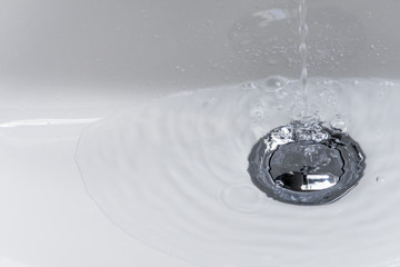 Water bubbling into a washbasin