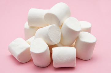 heap of marshmallow on pink