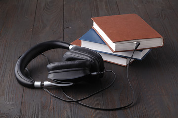 The concept is to listen to audiobooks. headphones are connected to the book