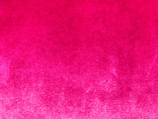 Lino printed texture background in magenta and pink.