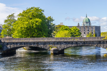 Fototapeta na wymiar Corrib river with Galway Cathedral in background