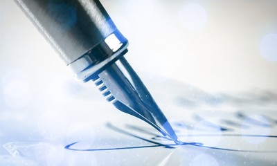 Signing a signature with a fountain pen