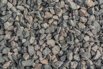 Stones from gray and red granite