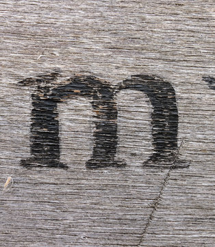 Written Wording in Distressed State Typography Found Letter M