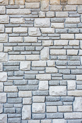 background, wall of different shapes of sharpened stones