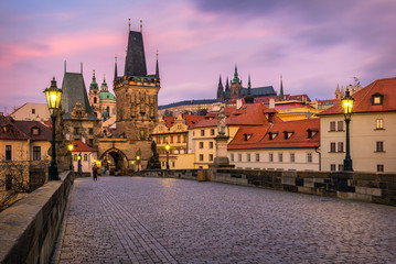 Fototapeta na wymiar Morning view of Charles Bridge in Prague, Czech Republic. The Charles Bridge is one of the most visited sights in Prague. Architecture and landmark of Prague