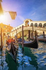 Fototapeten Canal with gondolas in Venice, Italy. Architecture and landmarks of Venice. Venice postcard with Venice gondolas. © daliu