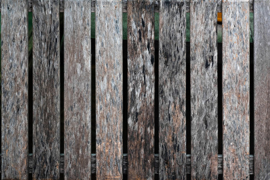 Close up of old brown wood lath with natural striped background and texture.