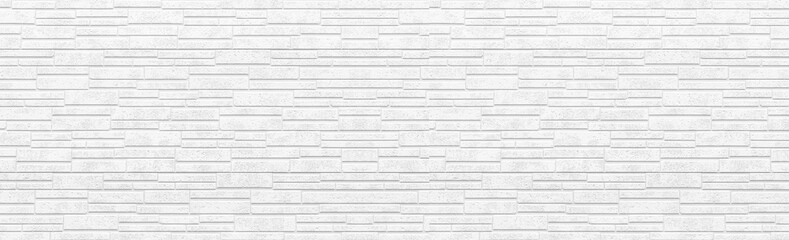 Naklejka premium Panorama of white modern stone wall pattern and background