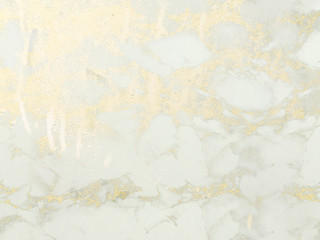 Gold marble background. Shiny, glitter and glossy effect for an elegant wallpaper.