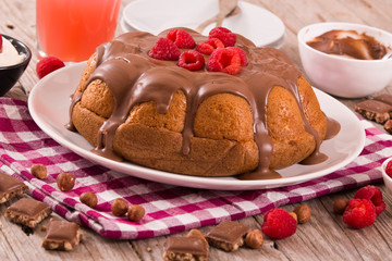 Fototapeta na wymiar Chocolate cake with raspberries.