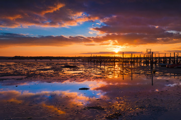 Fototapeta na wymiar Sunset over Poole Harbour jetty