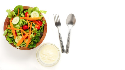 Fototapeta na wymiar Mixed vegetables salad with cream on white background. copy space