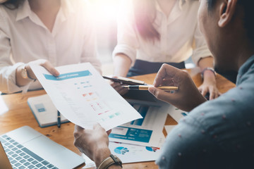 Financial,accounting, investment advisor consulting with her team at office. Teamwork Meeting Concept