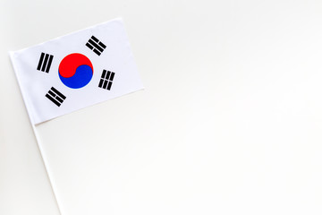 Korean flag concept. small flag on white background top view copy space