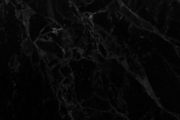 Abstract black marble background with natural motifs.