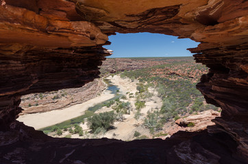Nature's Window, a natural, wind eroded, sandstone rock in the Kalbarri National Park. The view through the window is of the Murchison River running through its gorge. Western Australia.