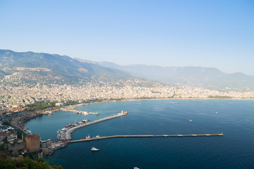 Alanya peninsula, Alanya, Turkey. Tourist ships on the Mediterranean Sea. Port of Alanya. Alanya is a beach resort city and a component district of Antalya Province on the southern coast of Turkey