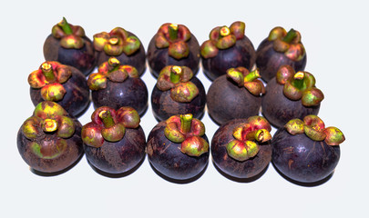 Mangosteen, the queen of thai fruit, isolated on white background.
