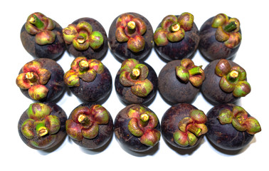 Mangosteen, the queen of thai fruit, isolated on white background.