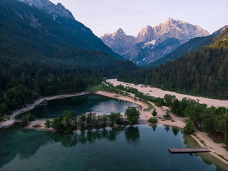 Fototapeta na wymiar Aerial view over lake Jasna in Slovenia and Julian Alps